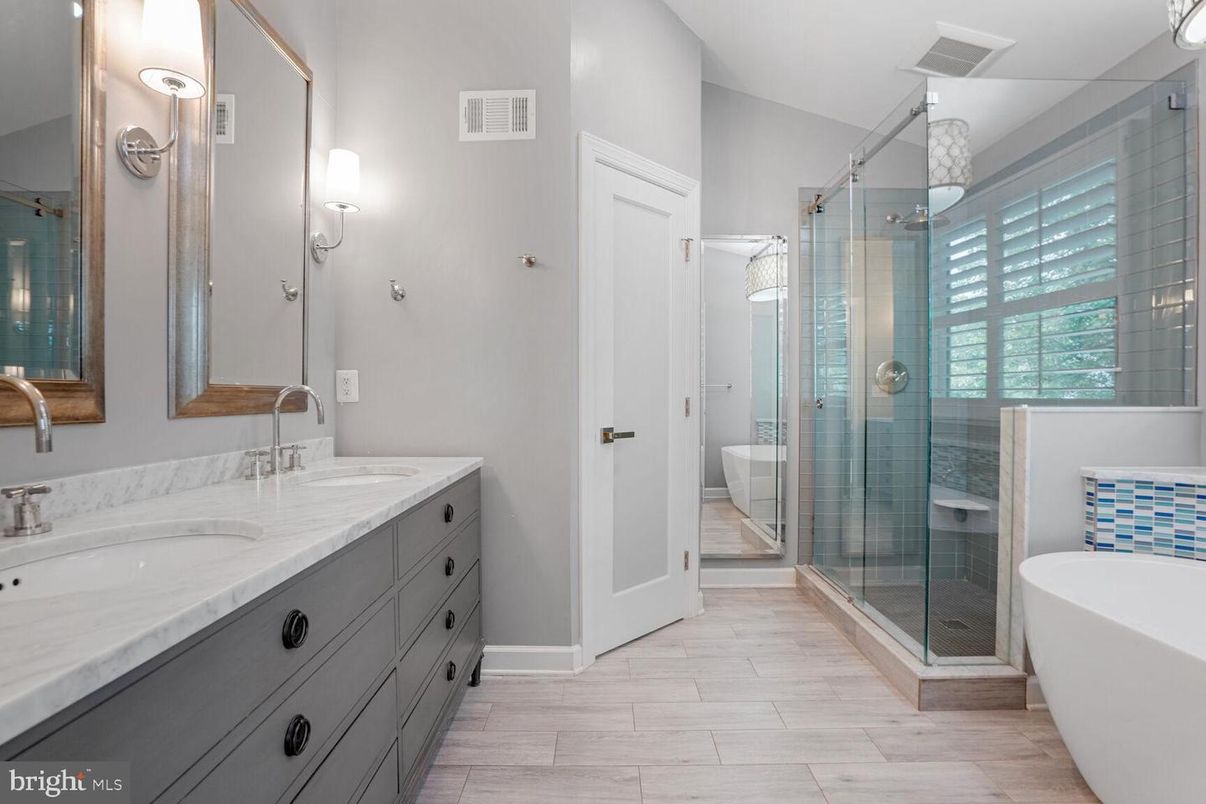 Bathroom, Dual Sink Vanities, Free Standing Baths, Glass Shower, Interior, Wood Texture Flooring