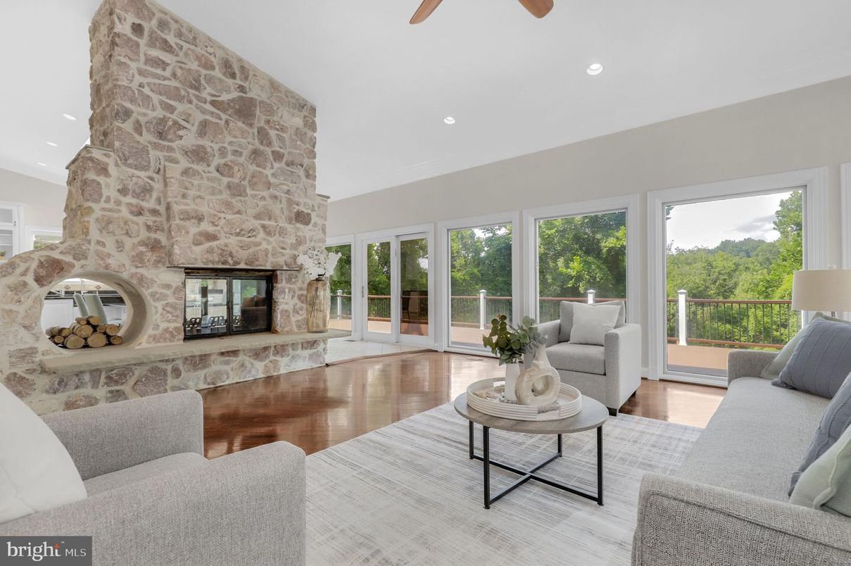 Fireplace, Interior, Living room, Recessed Lighting, Stone Walls, Wood Texture Flooring