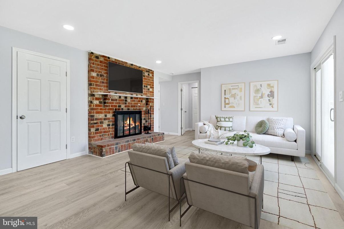 Fireplace, Interior, Living room, Recessed Lighting, Stone Walls, Wood Texture Flooring