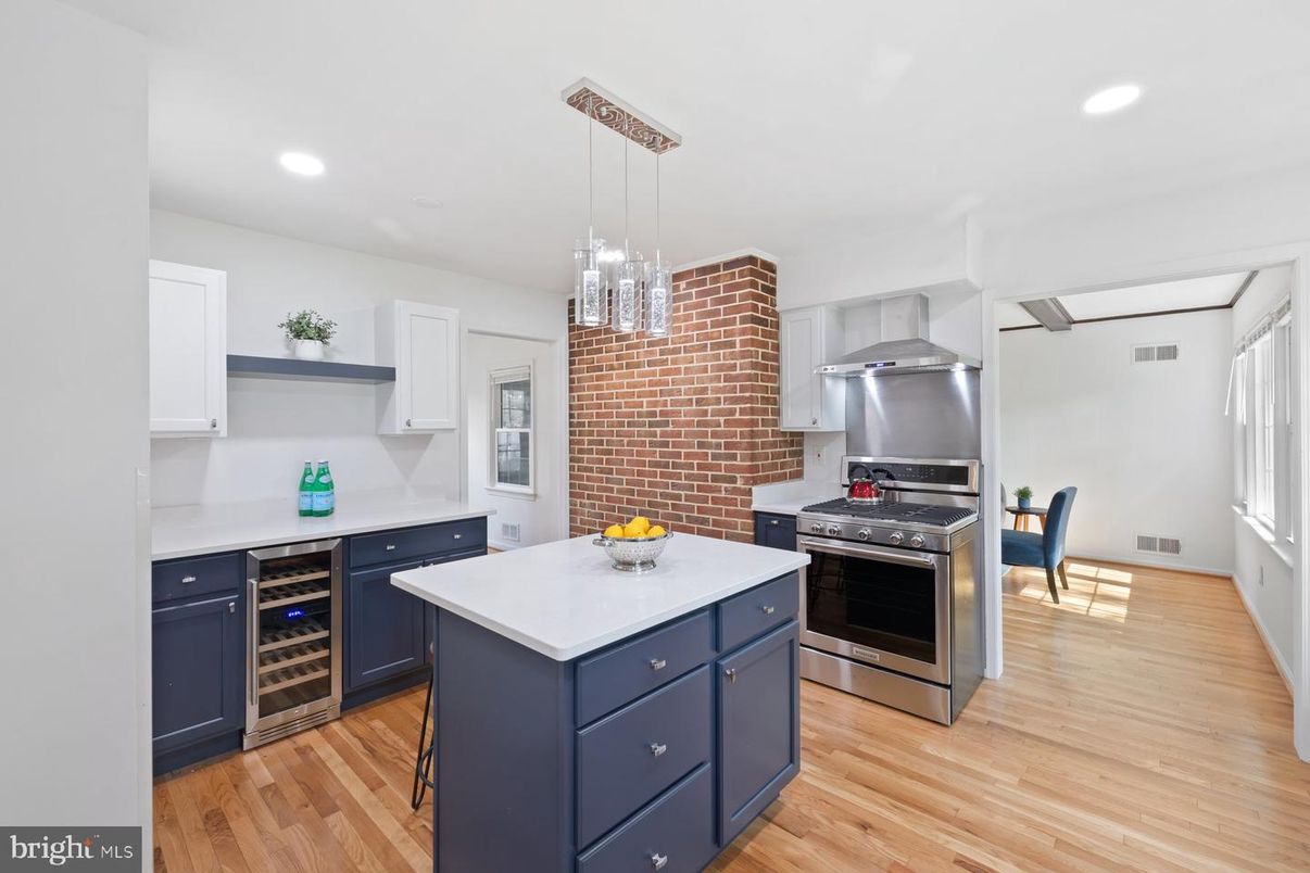 Interior, Kitchen, Pendant Lights, Recessed Lighting, Stainless Steel Appliances, Stone Walls, Wood Texture Flooring