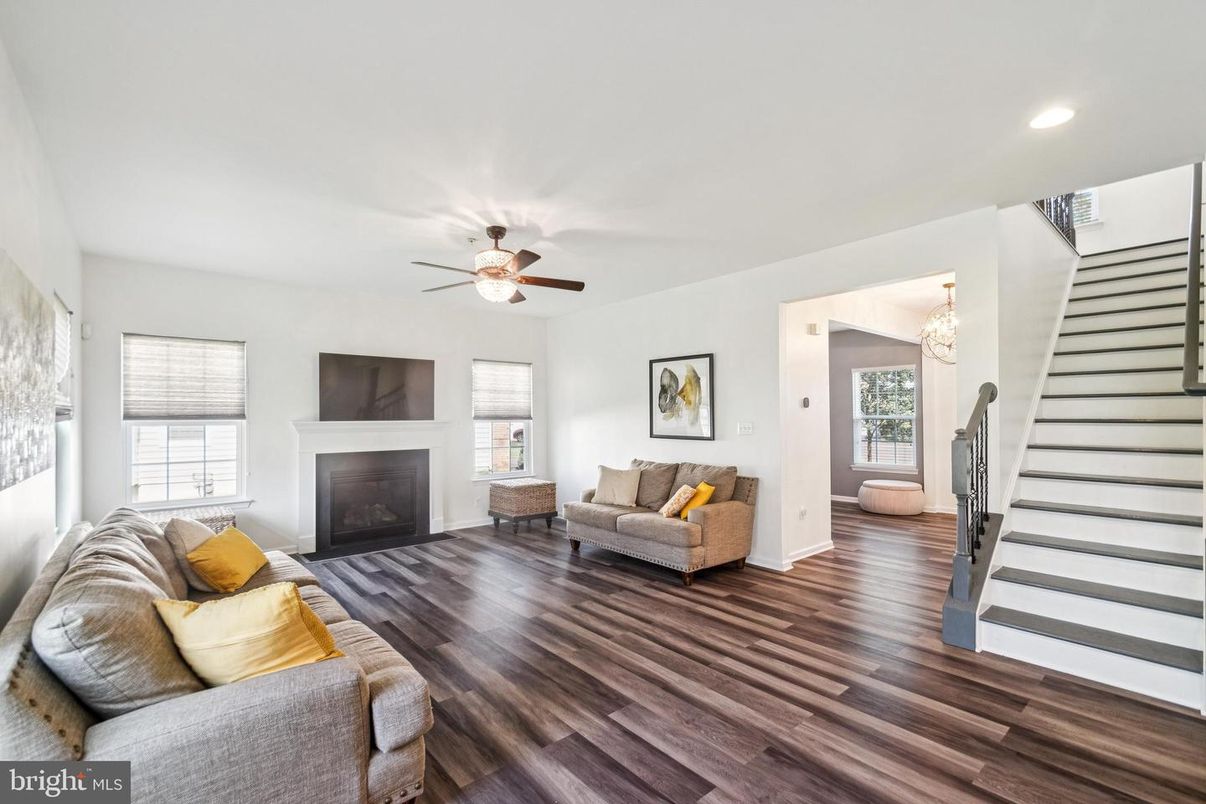 Chandelier, Fireplace, Interior, Living room, Recessed Lighting, Wood Texture Flooring