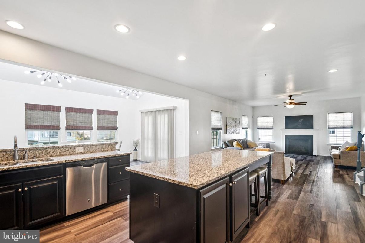 Fireplace, Interior, Kitchen, Living room, Recessed Lighting, Wood Texture Flooring
