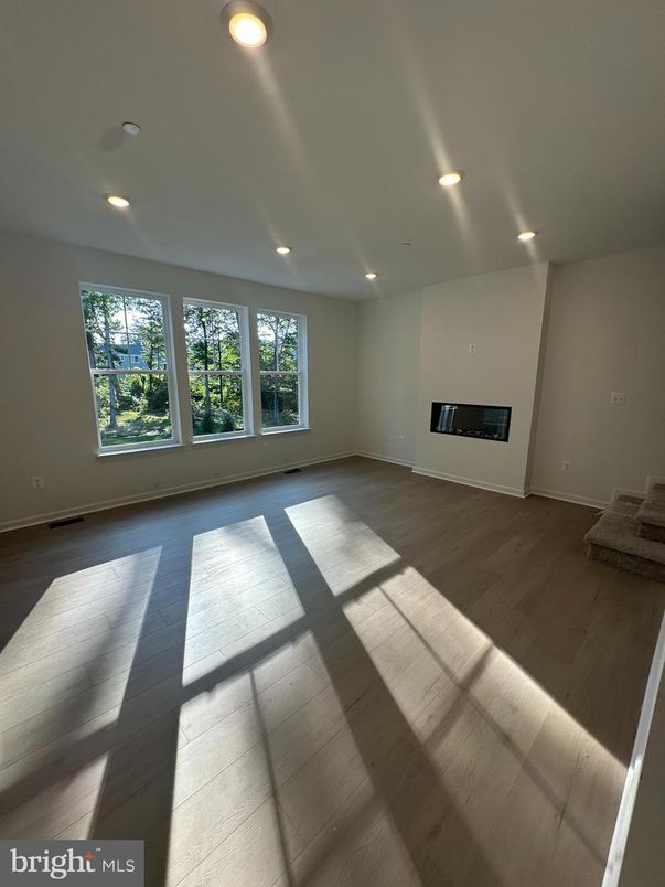 Empty room, Fireplace, Interior, Recessed Lighting, Wood Texture Flooring