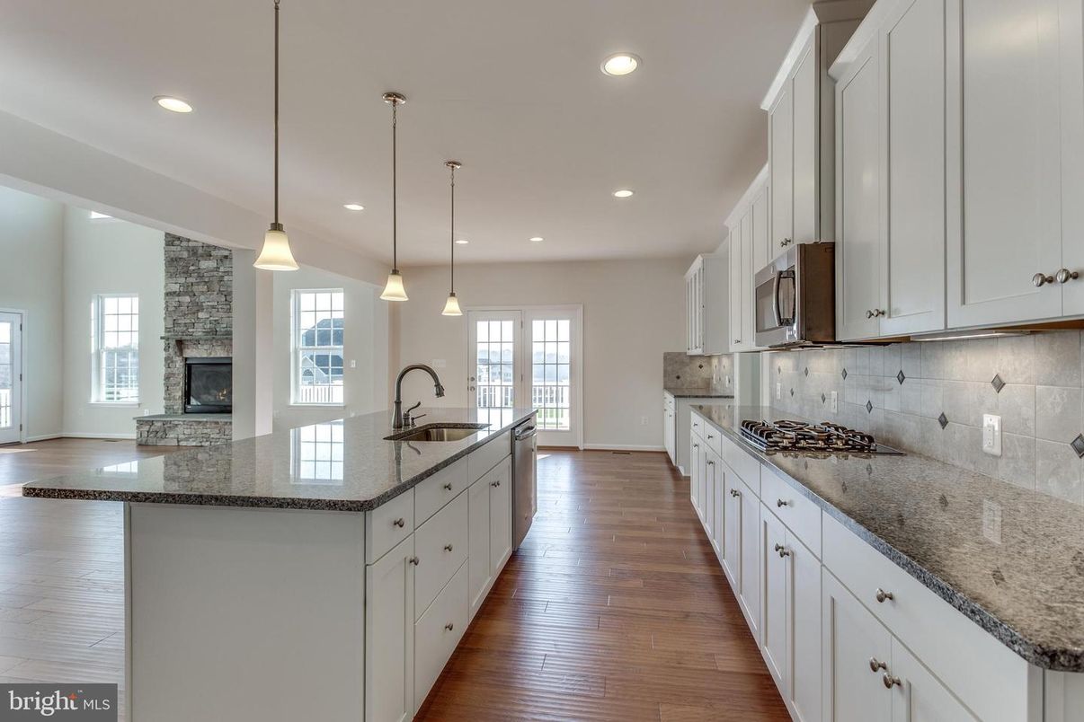 Fireplace, Interior, Kitchen, Pendant Lights, Recessed Lighting, Wood Texture Flooring