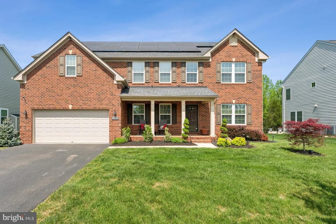 Attached, Exterior, Facade, Brick Facade, Solar Panels, Brick Traditional