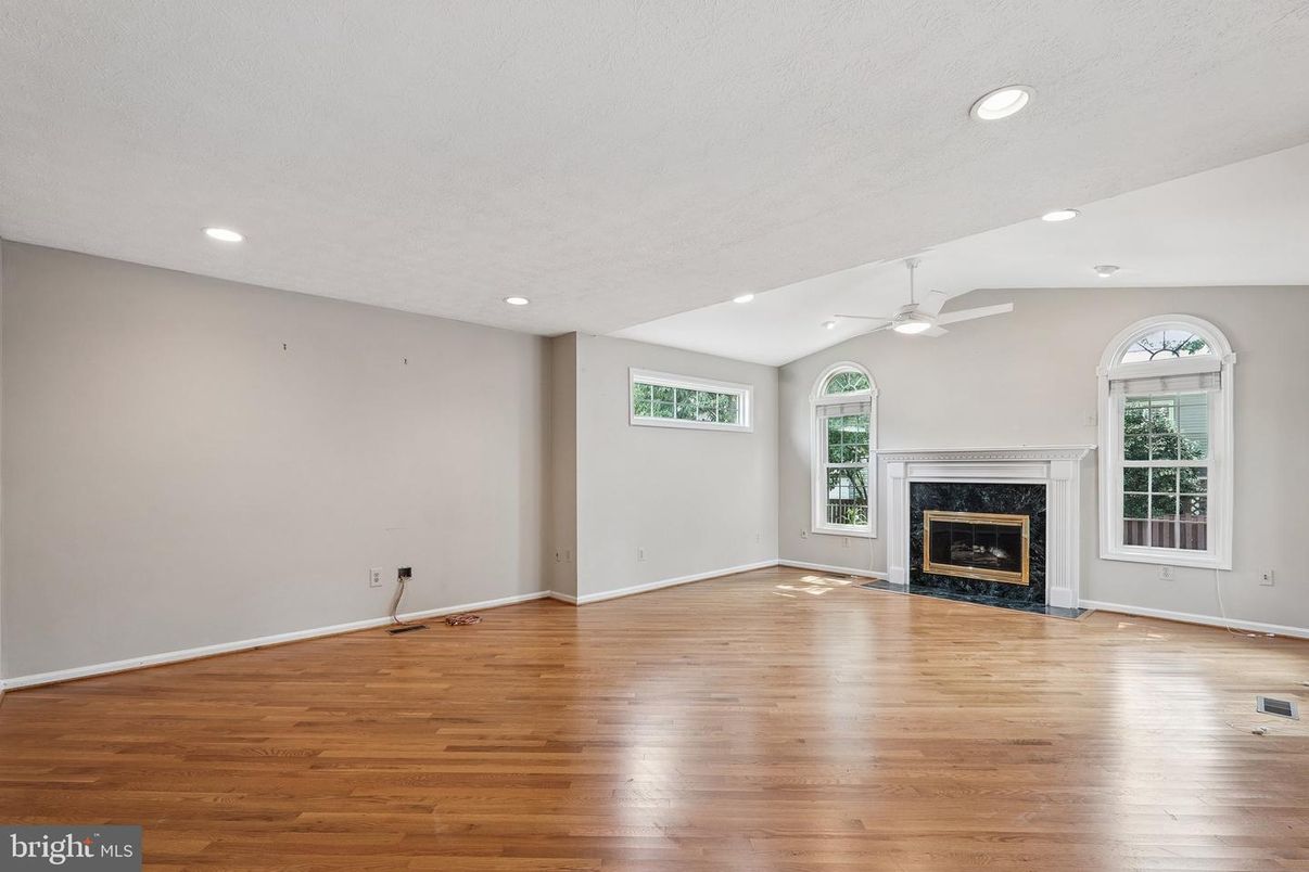 Empty room, Fireplace, Interior, Recessed Lighting, Wood Texture Flooring