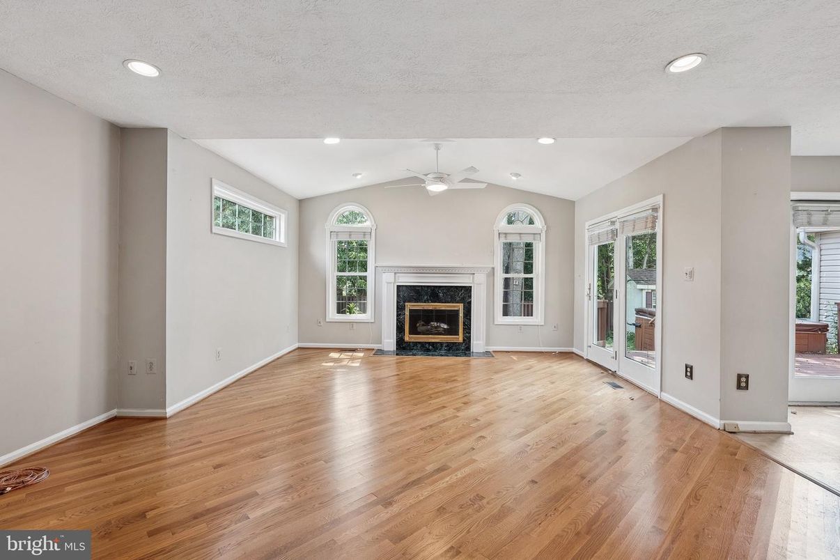 Empty room, Fireplace, Interior, Recessed Lighting, Wood Texture Flooring