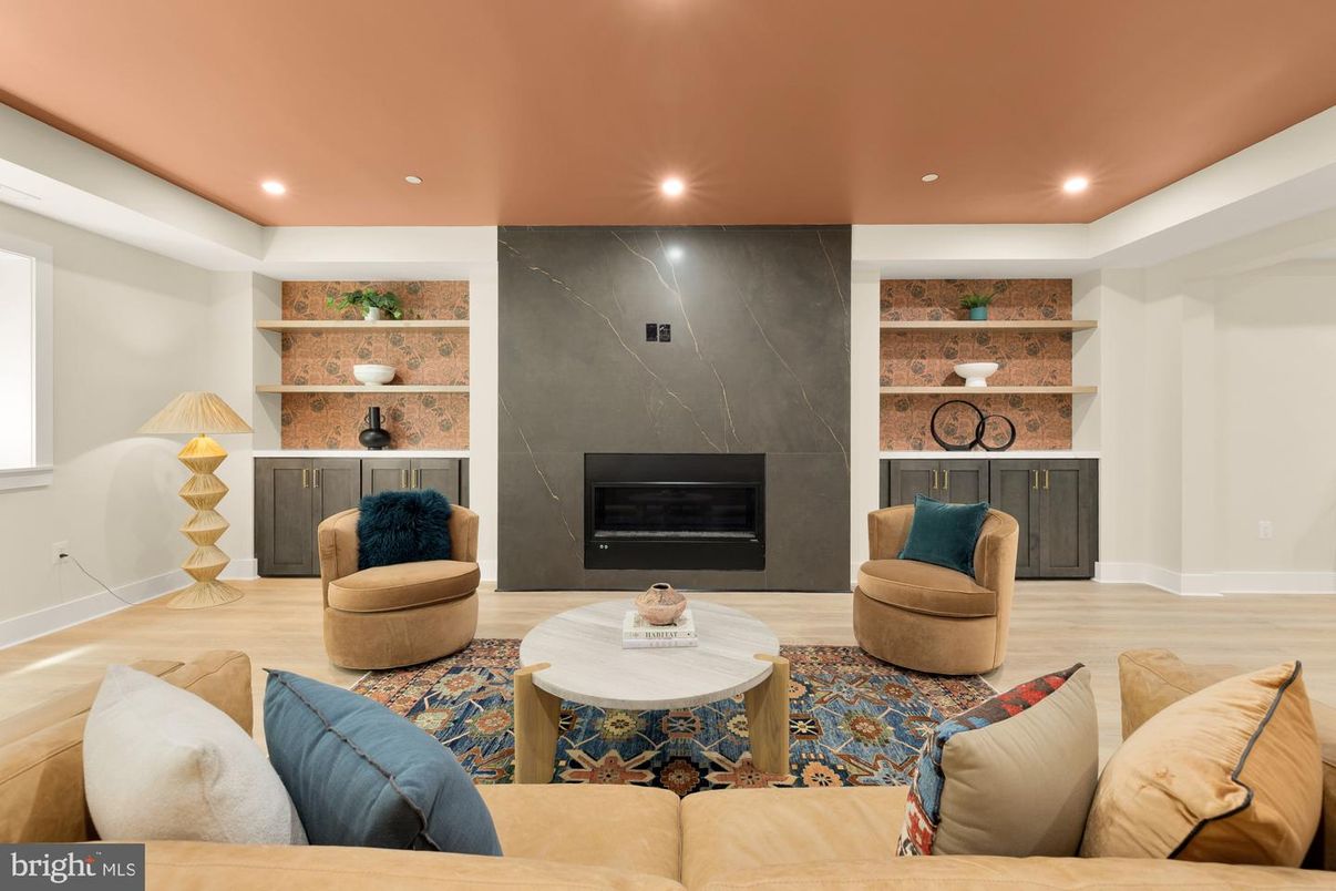 Fireplace, Interior, Living room, Marble Walls, Recessed Lighting, Wood Texture Flooring