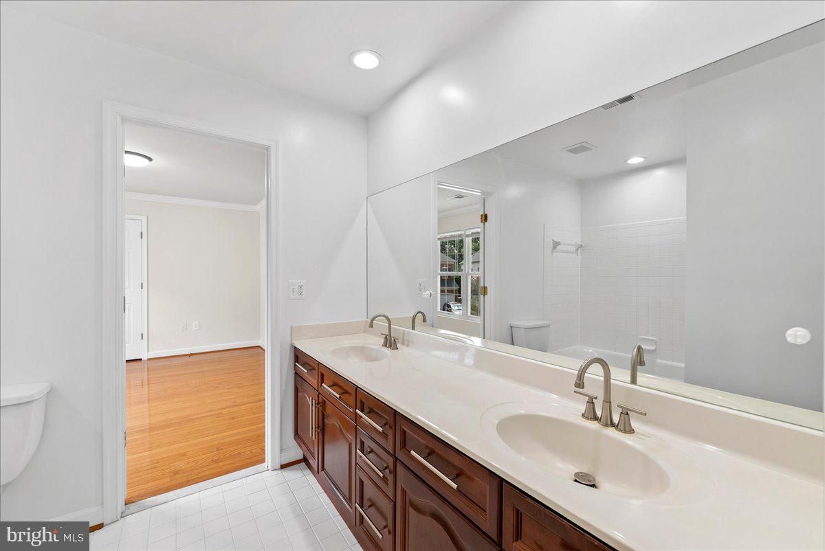 Bathroom, Dual Sink Vanities, Interior, Recessed Lighting, Wood Texture Flooring