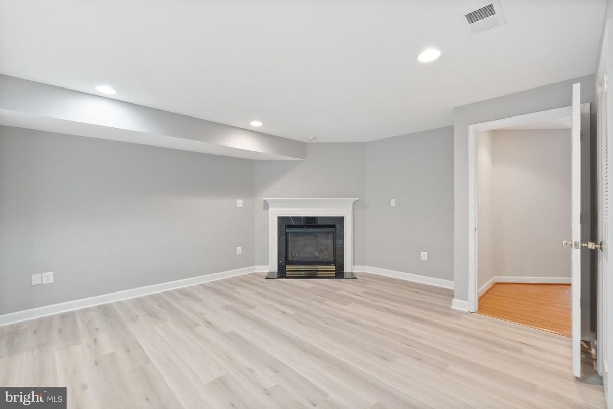Empty room, Fireplace, Interior, Recessed Lighting, Wood Texture Flooring