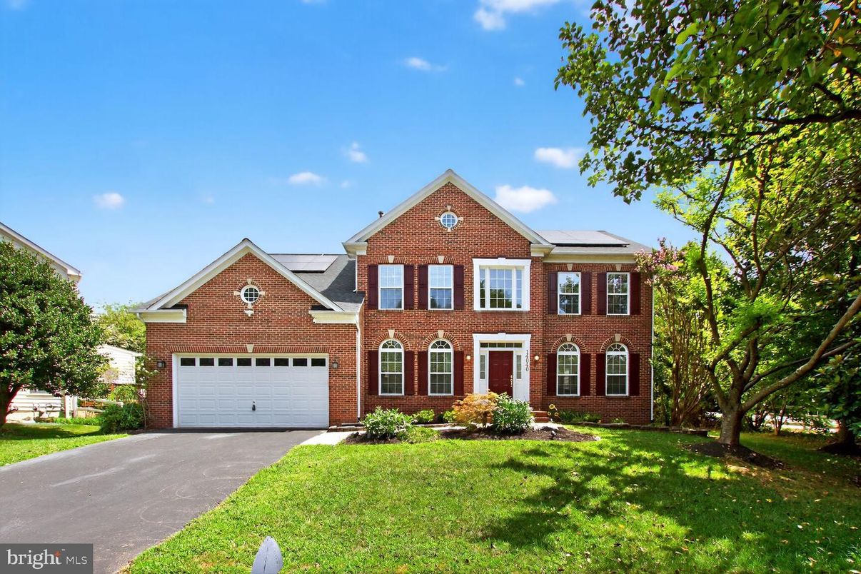 Attached, Exterior, Facade, Brick Facade, Solar Panels, Brick Traditional