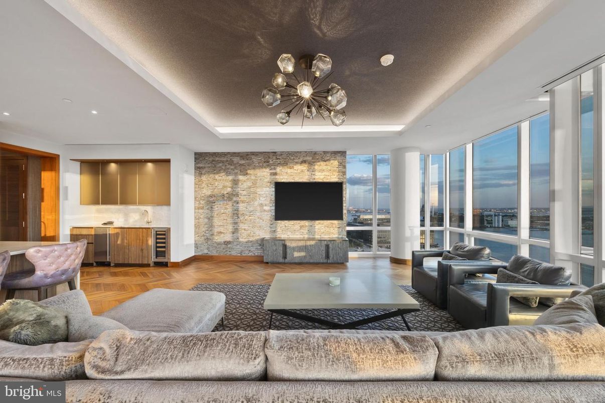 Fireplace, Interior, Living room, Recessed Lighting, Stone Walls, Wood Texture Flooring