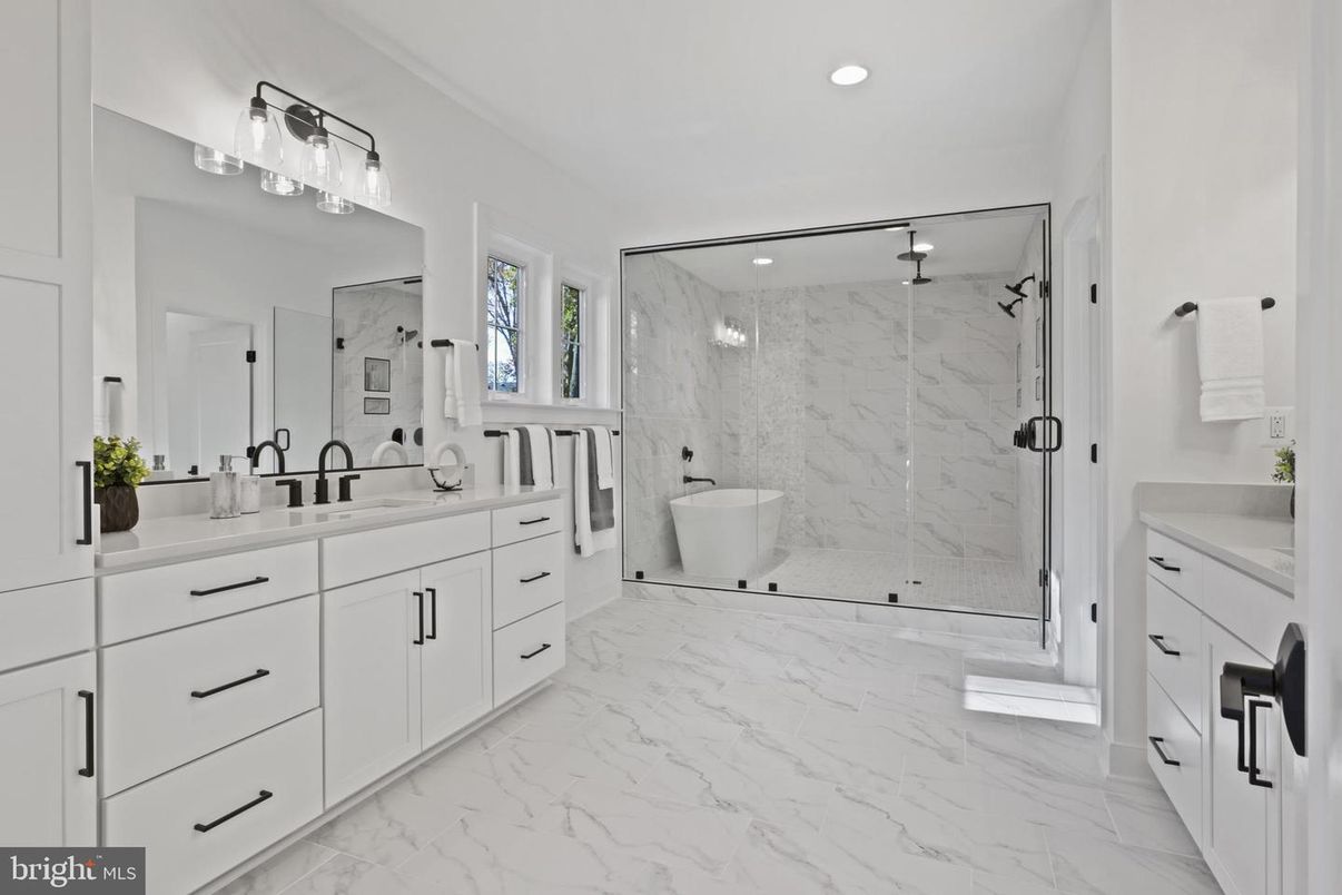 Bathroom, Dual Sink Vanities, Free Standing Baths, Glass Shower, Interior, Marble, Marble Walls, Recessed Lighting