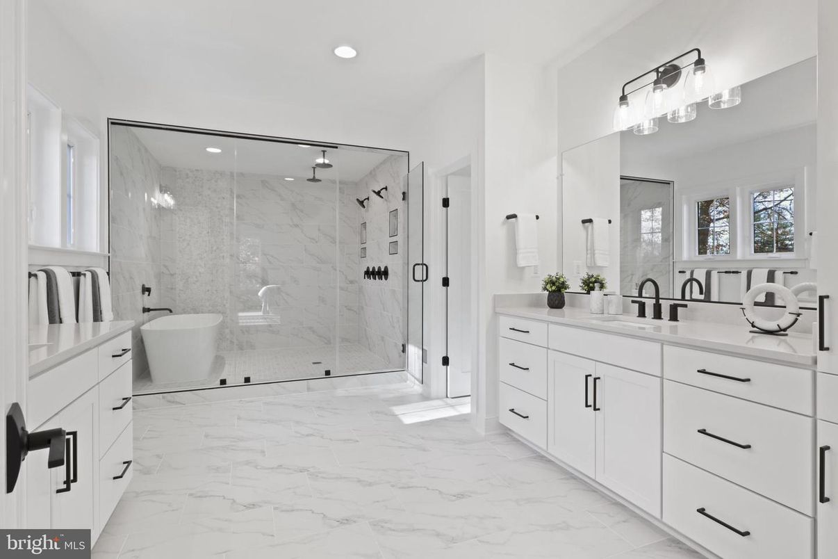 Bathroom, Dual Sink Vanities, Free Standing Baths, Glass Shower, Interior, Marble, Marble Walls, Recessed Lighting