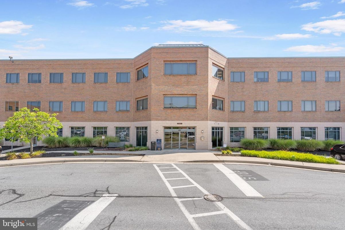 Exterior, Facade, Brick Facade, Condo Building