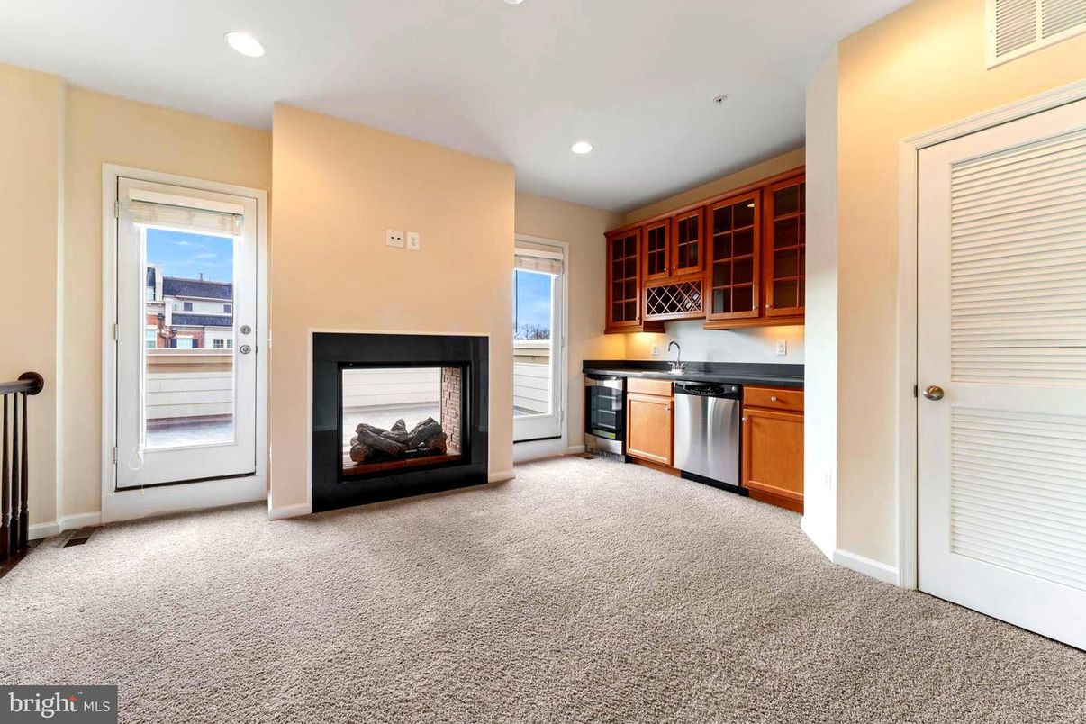 Fireplace, Interior, Kitchen, Recessed Lighting, Stainless Steel Appliances