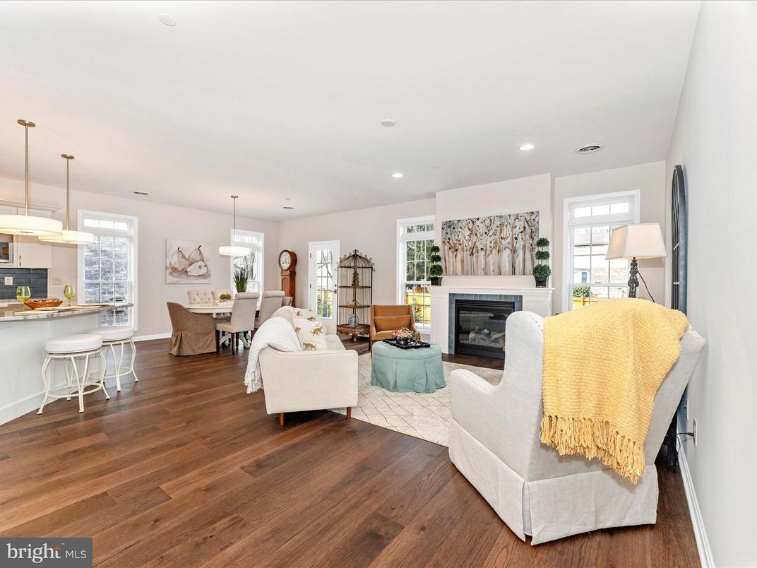 Dining room, Fireplace, Interior, Living room, Pendant Lights, Recessed Lighting, Wood Texture Flooring
