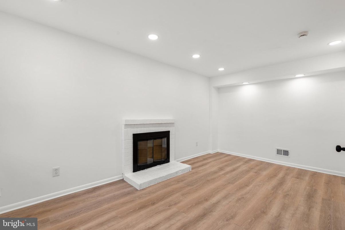 Empty room, Fireplace, Interior, Recessed Lighting, Wood Texture Flooring