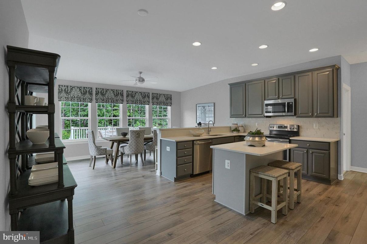 Dining room, Interior, Kitchen, Recessed Lighting, Stainless Steel Appliances, Wood Texture Flooring