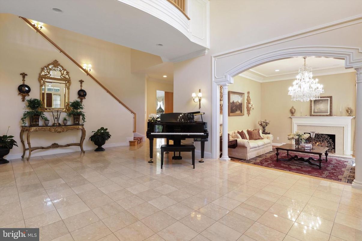 Chandelier, Fireplace, Interior, Living room, Piano, Recessed Lighting