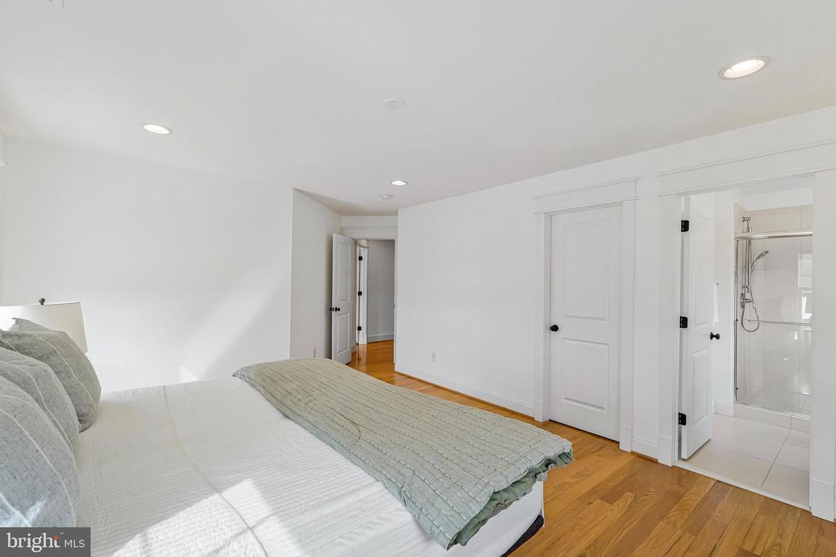 Bathroom, Bedroom, Glass Shower, Interior, Recessed Lighting, Wood Texture Flooring