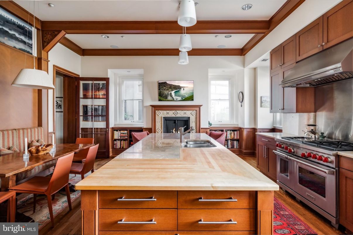 Dining room, Fireplace, Interior, Kitchen, Pendant Lights, Recessed Lighting, Stainless Steel Appliances, Wooden Beams, Wood Texture Flooring