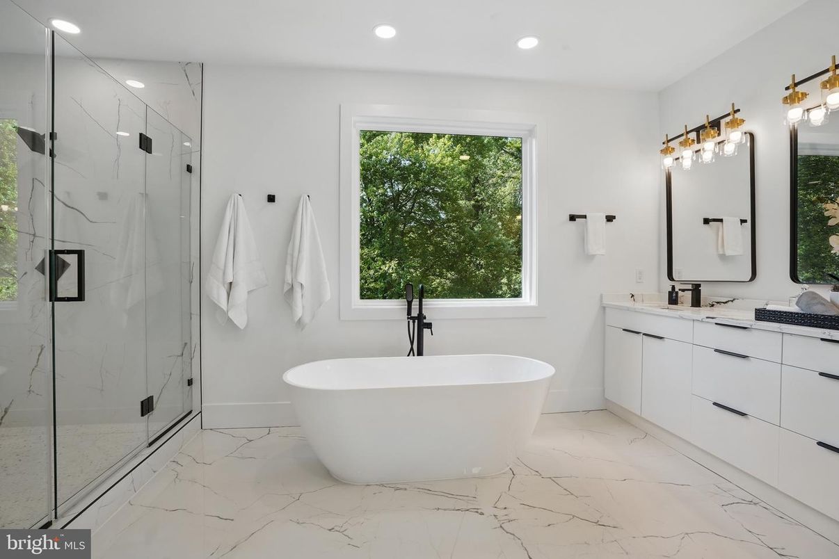 Bathroom, Dual Sink Vanities, Free Standing Baths, Glass Shower, Interior, Marble, Marble Walls, Recessed Lighting