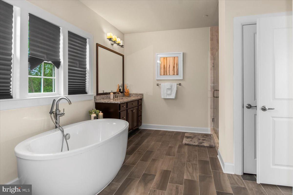 Bathroom, Dual Sink Vanities, Free Standing Baths, Interior, Wood Texture Flooring