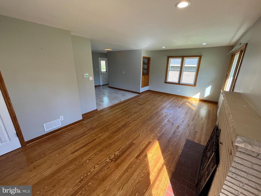 Empty room, Fireplace, Interior, Recessed Lighting, Wood Texture Flooring