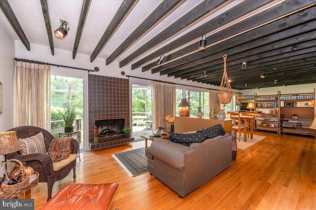 Dining room, Fireplace, Interior, Living room, Pendant Lights, Wooden Beams, Wood Texture Flooring