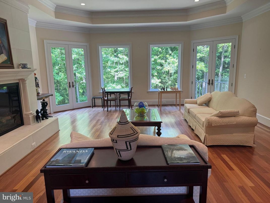 Dining room, Fireplace, Interior, Living room, Recessed Lighting, Wood Texture Flooring