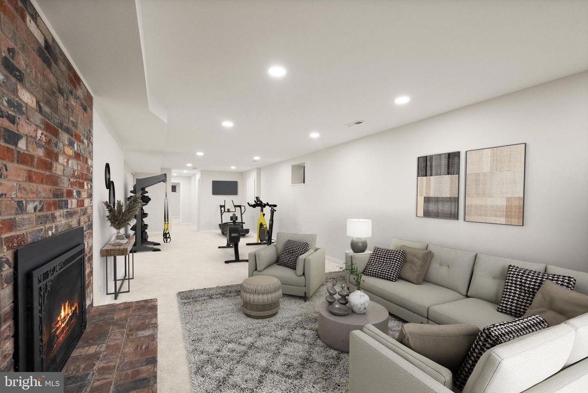 Fireplace, Fitness Equipment, Interior, Living room, Recessed Lighting, Stone Walls