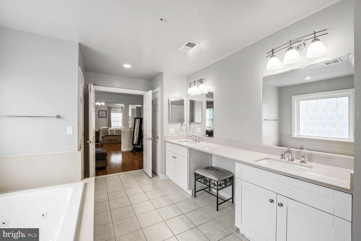 Bathroom, Dual Sink Vanities, Interior, Recessed Lighting, Wood Texture Flooring