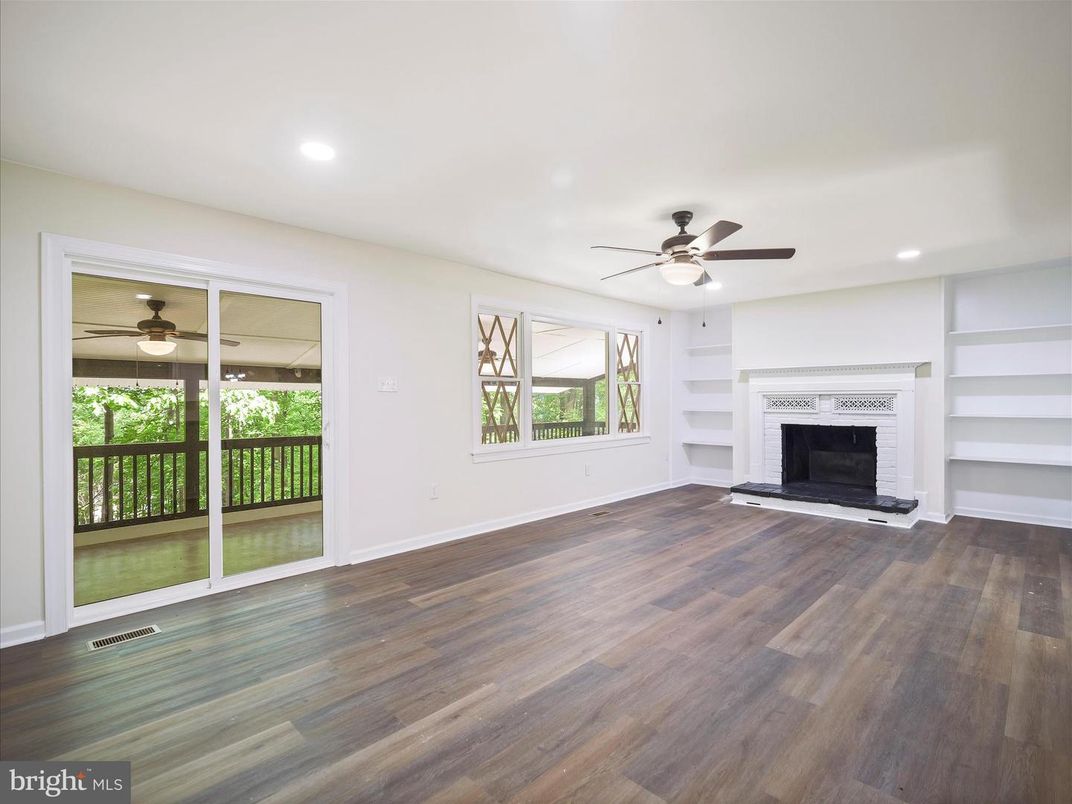 Empty room, Fireplace, Interior, Recessed Lighting, Wood Texture Flooring
