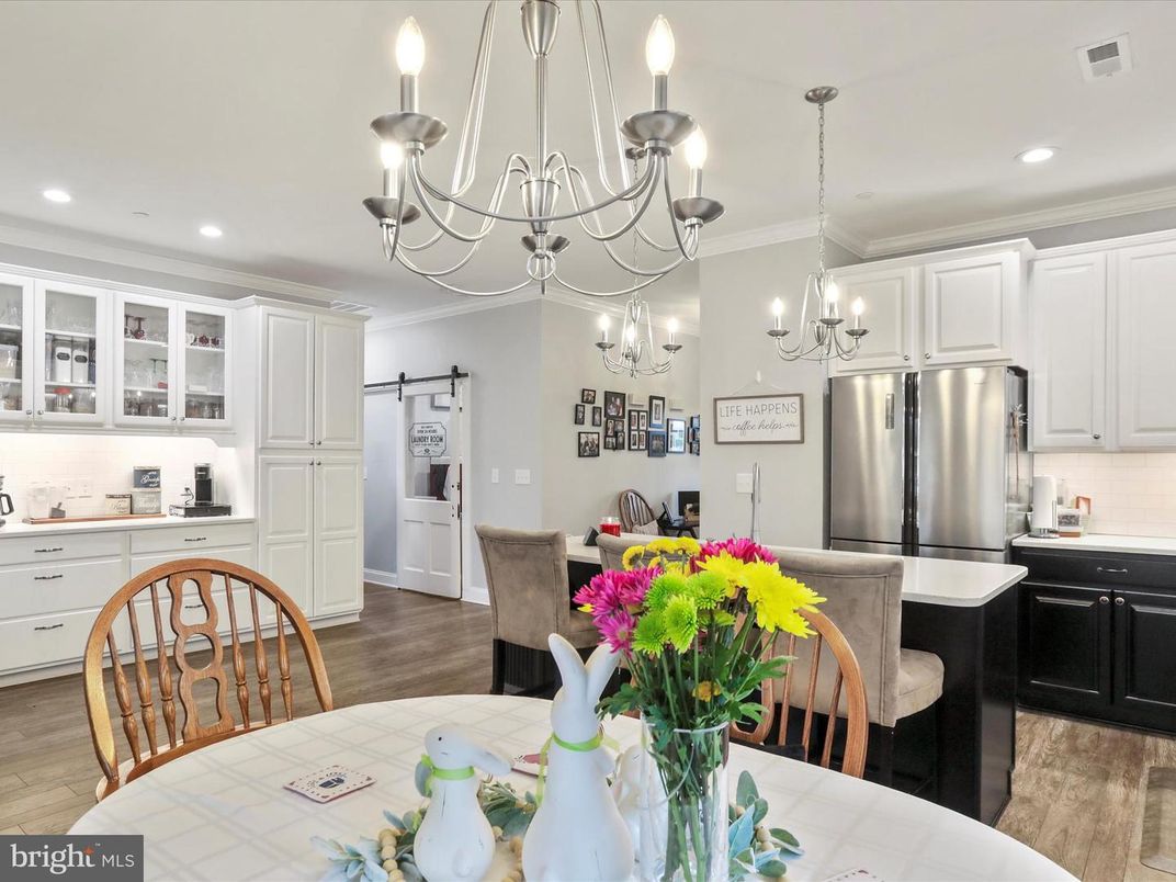 Chandelier, Dining room, Interior, Kitchen, Recessed Lighting, Stainless Steel Appliances, Wood Texture Flooring