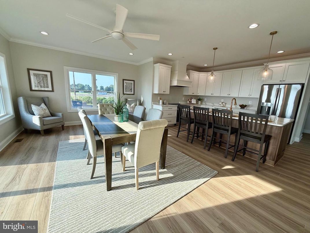 Dining room, Interior, Kitchen, Pendant Lights, Recessed Lighting, Stainless Steel Appliances, Wood Texture Flooring