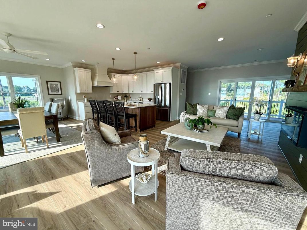 Dining room, Interior, Kitchen, Living room, Pendant Lights, Recessed Lighting, Stainless Steel Appliances, Wood Texture Flooring