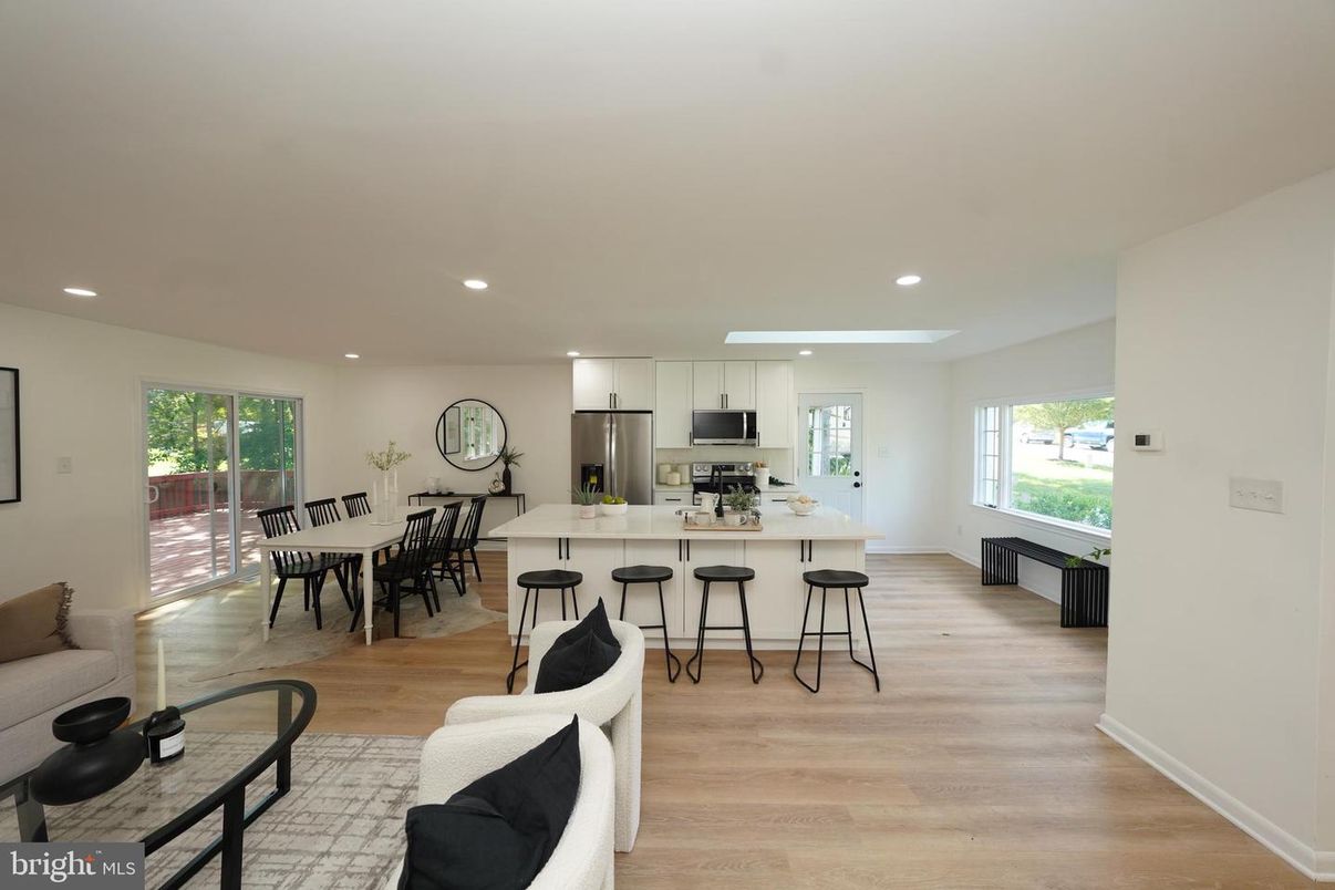 Dining room, Interior, Kitchen, Recessed Lighting, Stainless Steel Appliances, Wood Texture Flooring
