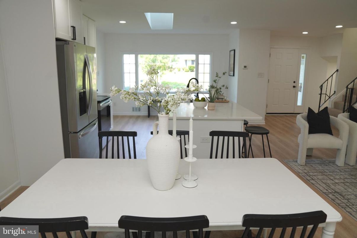 Dining room, Interior, Kitchen, Recessed Lighting, Stainless Steel Appliances, Wood Texture Flooring