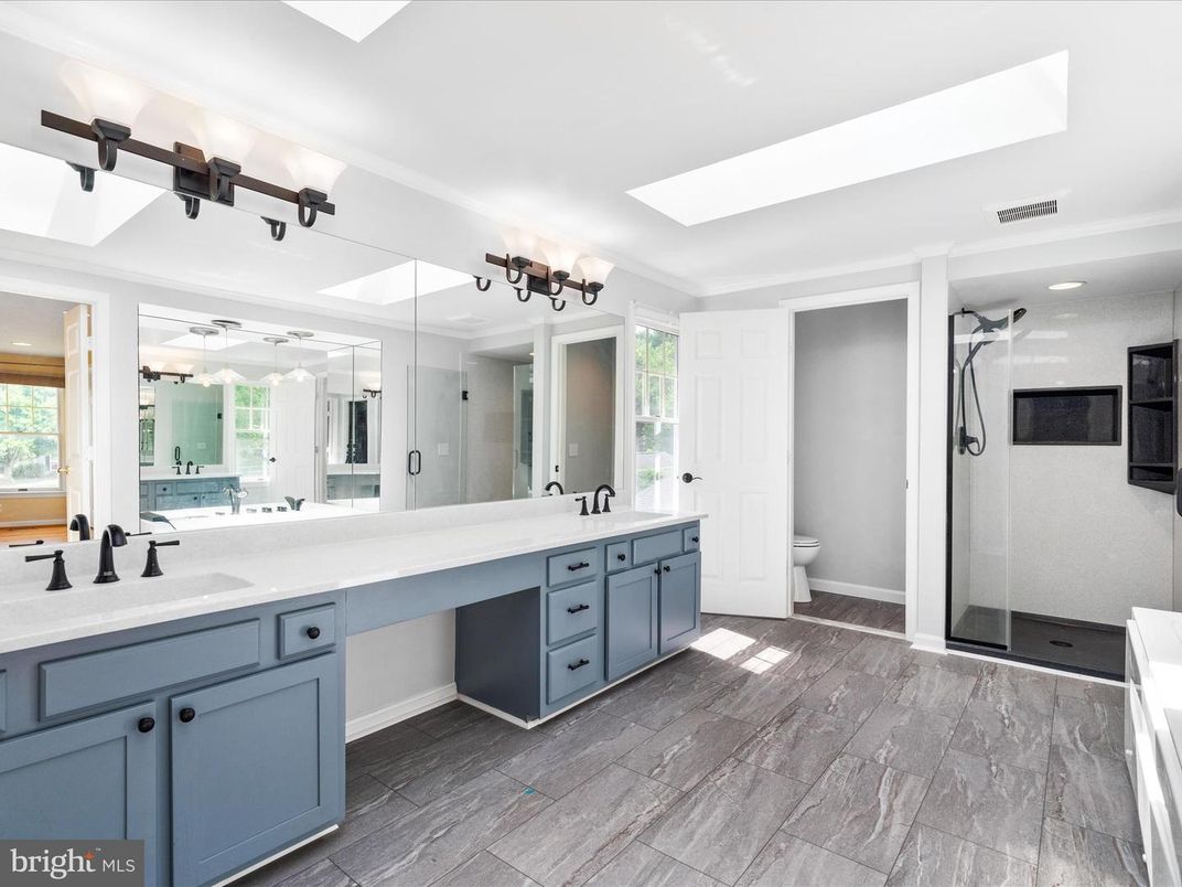 Bathroom, Dual Sink Vanities, Interior, Recessed Lighting, Wood Texture Flooring
