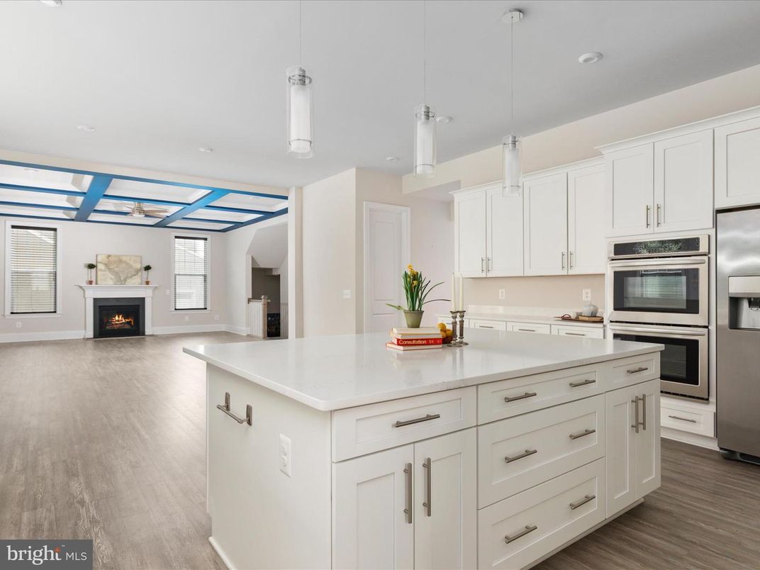 Fireplace, Interior, Kitchen, Pendant Lights, Recessed Lighting, Stainless Steel Appliances, Wood Texture Flooring