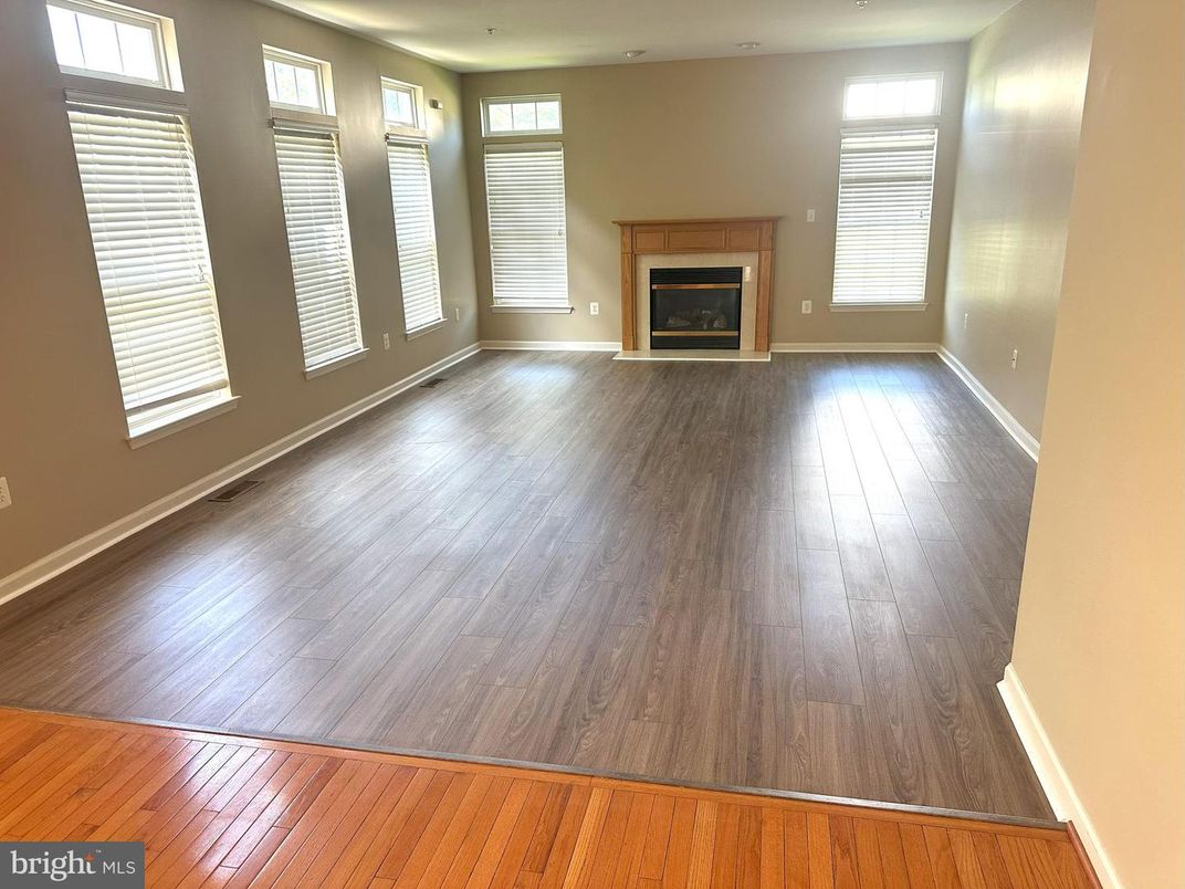 Empty room, Fireplace, Interior, Recessed Lighting, Wood Texture Flooring