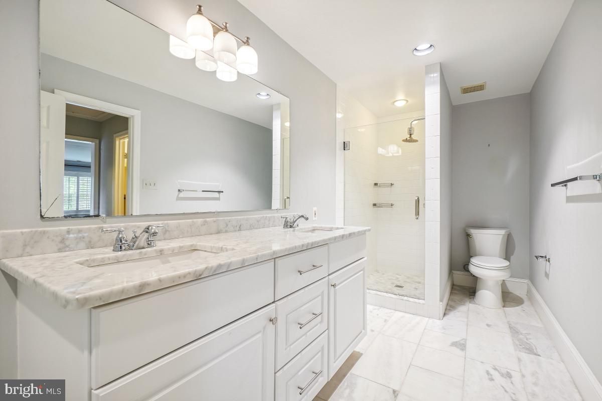 Bathroom, Dual Sink Vanities, Glass Shower, Interior, Marble, Recessed Lighting