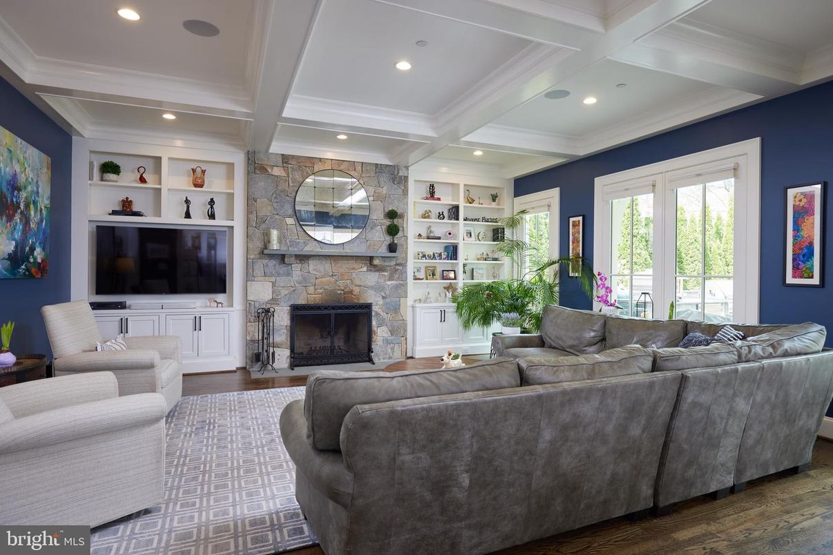 Fireplace, Interior, Living room, Recessed Lighting, Stone Walls, Wood Texture Flooring