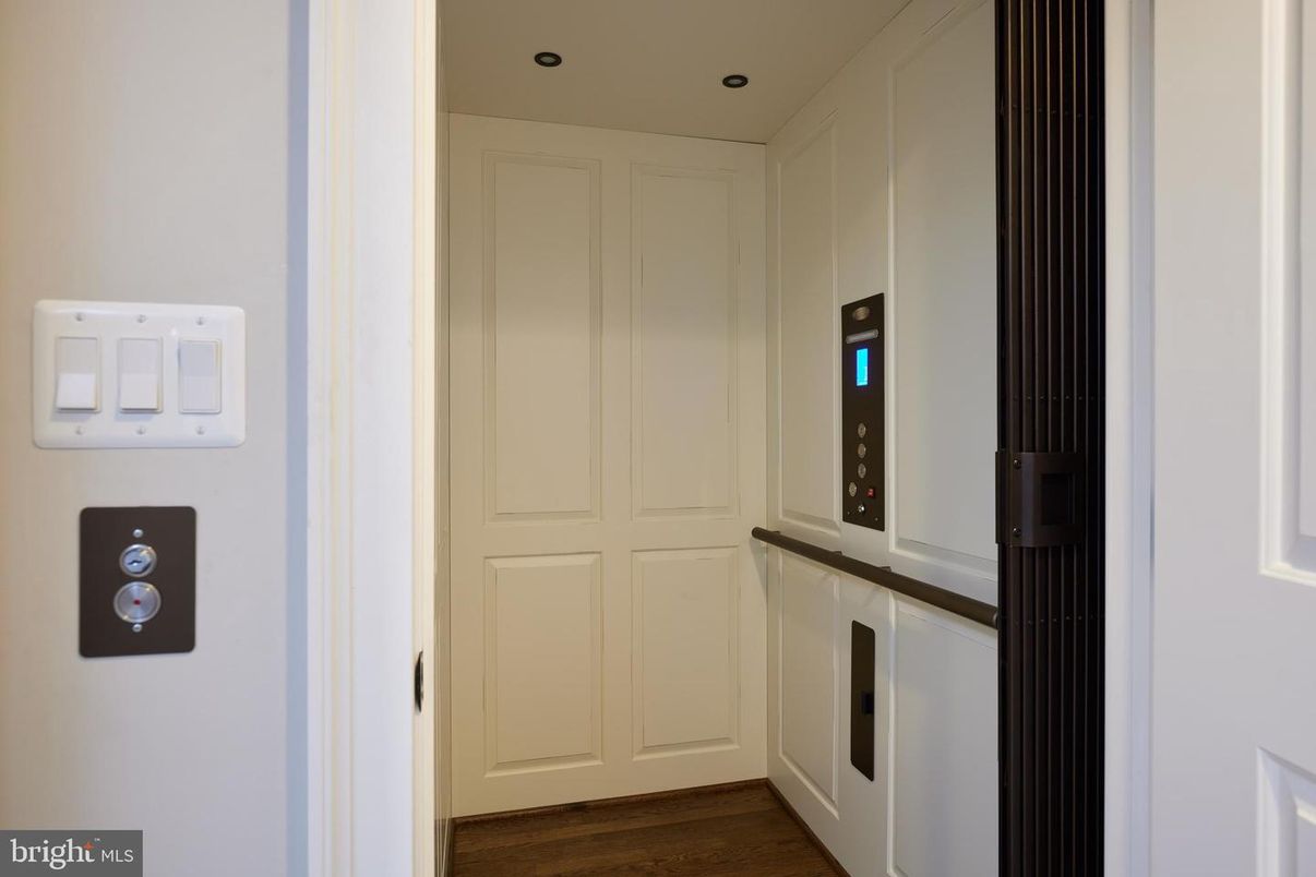 Elevator, Interior, Recessed Lighting, Wood Texture Flooring