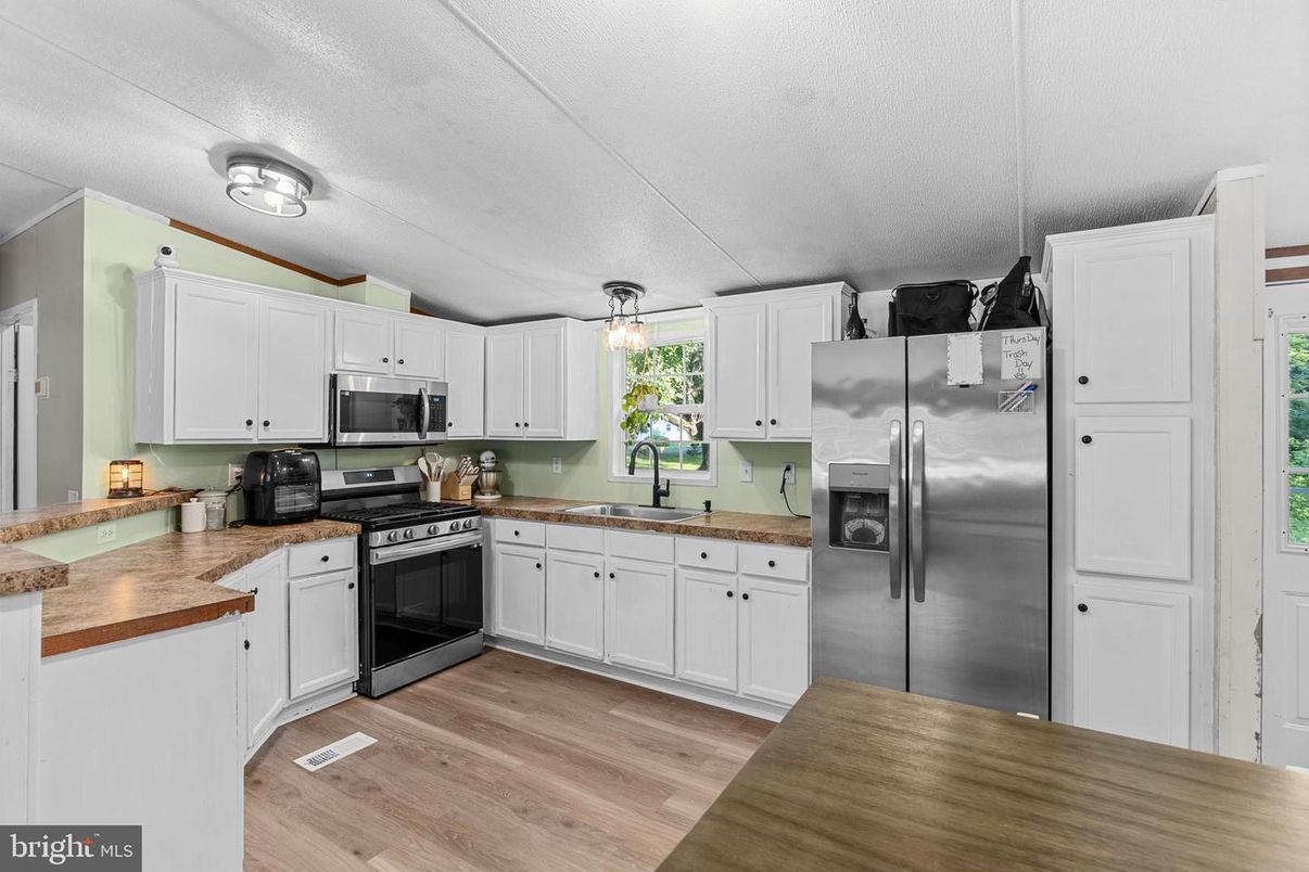 Interior, Kitchen, Pendant Lights, Stainless Steel Appliances, Wood Texture Flooring