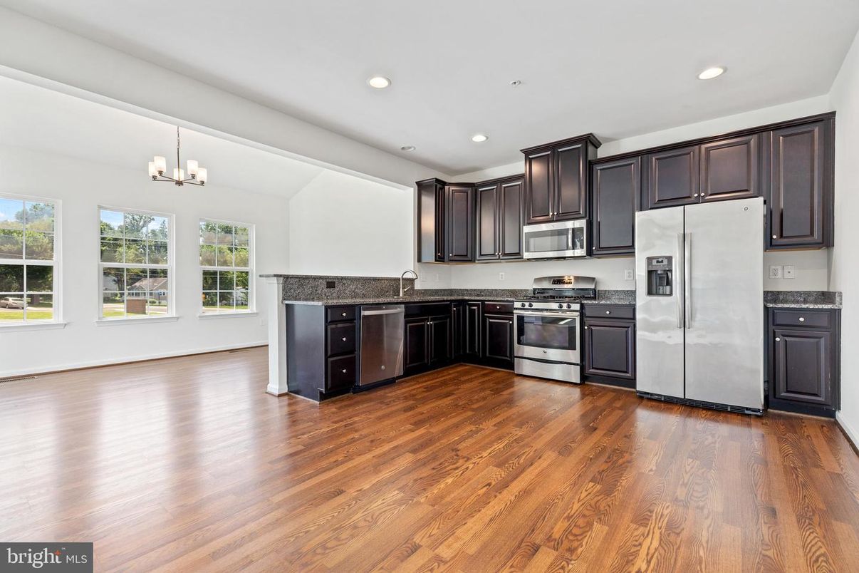 Chandelier, Interior, Kitchen, Recessed Lighting, Stainless Steel Appliances, Wood Texture Flooring