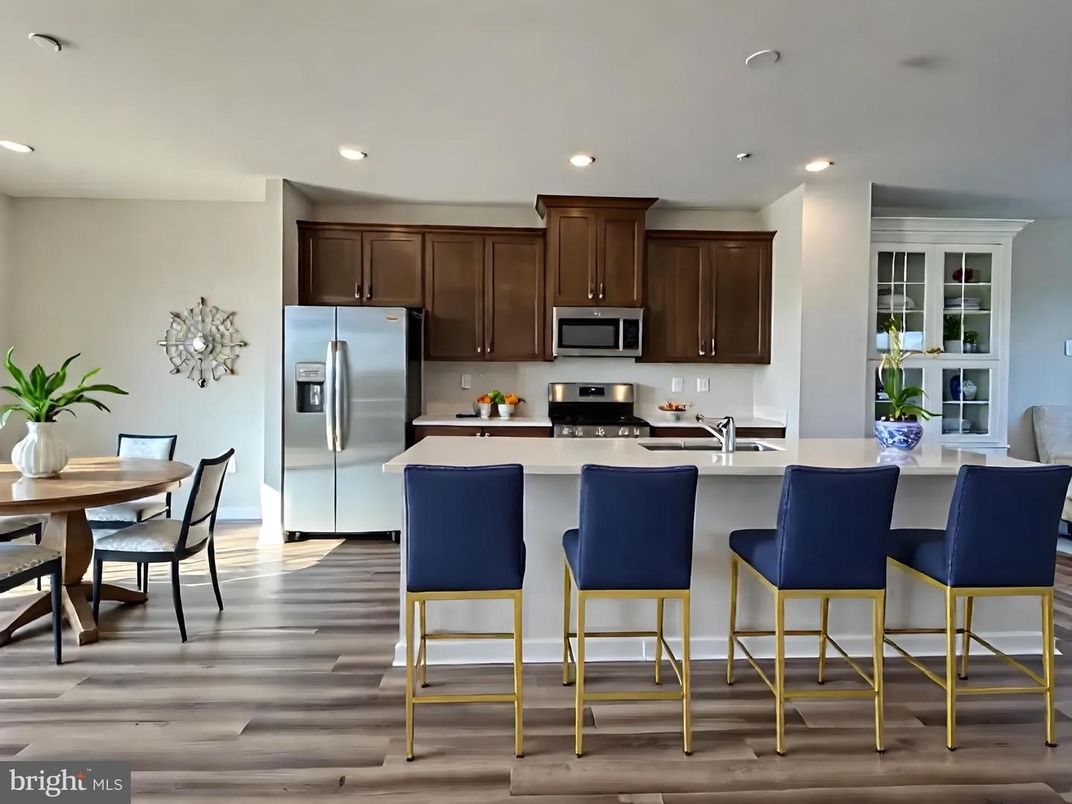 Dining room, Interior, Kitchen, Recessed Lighting, Stainless Steel Appliances, Wood Texture Flooring