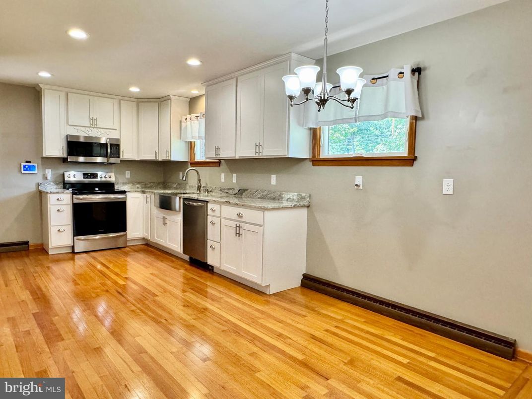 Chandelier, Interior, Kitchen, Recessed Lighting, Stainless Steel Appliances, Wood Texture Flooring
