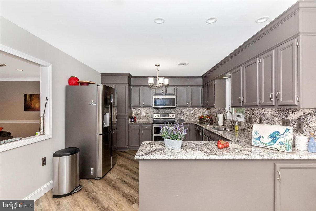 Chandelier, Interior, Kitchen, Pendant Lights, Recessed Lighting, Stainless Steel Appliances, Wood Texture Flooring
